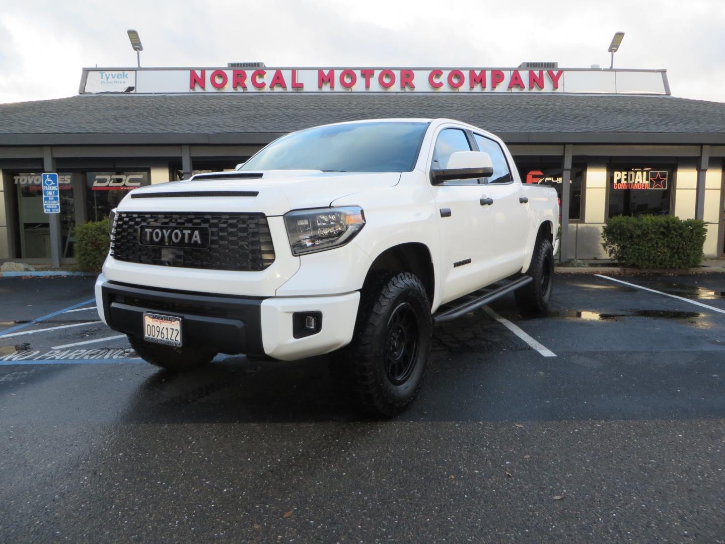 2020 White /BLACK Toyota Tundra SR5 5.7L V8 CrewMax 4WD (5TFDY5F12LX) with an 5.7L V8 DOHC 32V engine, 6A transmission, located at 2630 Grass Valley Highway, Auburn, CA, 95603, (530) 508-5100, 38.937893, -121.095482 - Clean tundra featuring a level kit, Icon Vehicle Dynamicxs upper control arms, 18" Method NV wheels, 35" BFG KO2 tires, Rocksliders, Retrax bedcover, Rigid Industries fog lights, RoadActive Suspension Custom Leaf Spring Enhancement Kit. - Photo#0